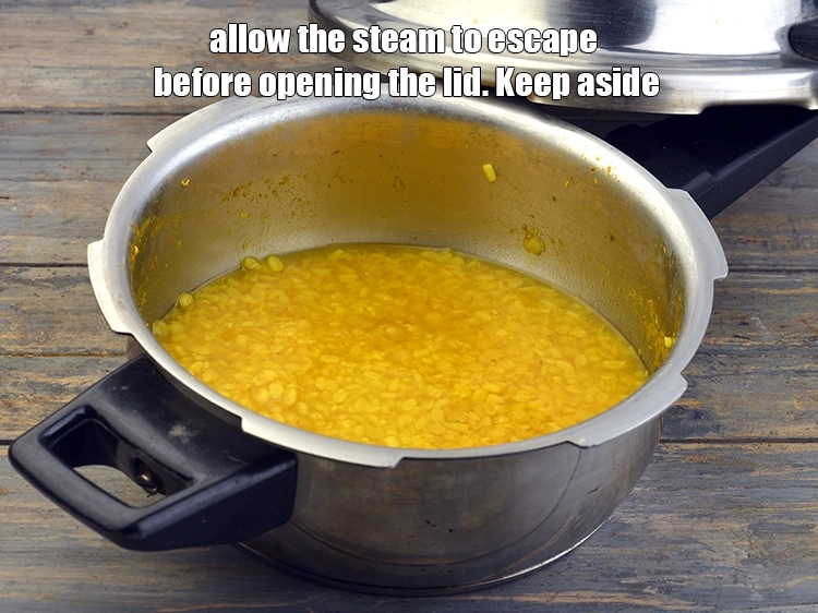 Step 9 – <p>ઢાંકણ ખોલતા પહેલા વરાળ બહાર નીકળવા દો. બાજુ પર રાખો.</p>