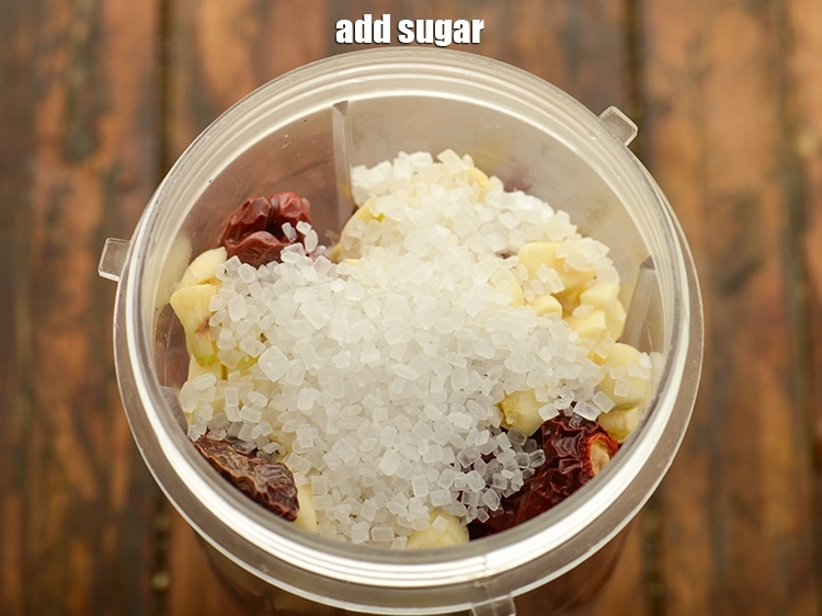 Step 9 – <p><span style="background-color:rgb(255,255,255);color:rgb(0,0,0);">1 ટેબલસ્પૂન </span><a href="https://www.tarladalal.com/glossary-sugar-chini-shakkar-gujarati-278i"><u>સાકર (sugar)</u></a><span style="background-color:rgb(255,255,255);color:rgb(0,0,0);"> ઉમેરો. તે સરકોનો પ્રતિકાર કરે છે અને મસાલેદાર …