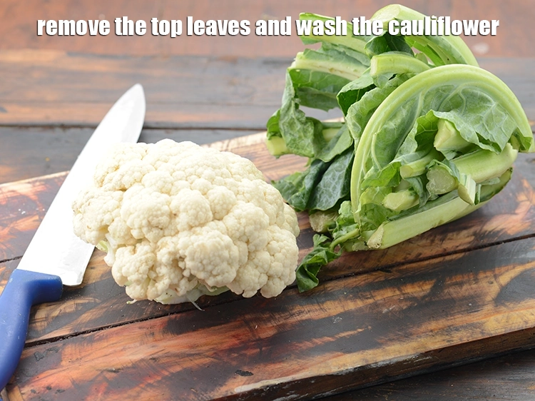 Step 28 – <p>ઉપરના પાન કાઢી નાખો અને <a href="https://www.tarladalal.com/glossary-cauliflower-phool-gobi-phool-gobhi-gujarati-174i">ફૂલકોબી</a> ધોઈ લો.&nbsp;</p>