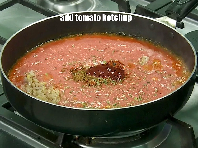 Step 13 – <p><span style="background-color:rgb(255,255,255);color:rgb(0,0,0);">1 ટીસ્પૂન </span><a href="https://www.tarladalal.com/glossary-tomato-ketchup-tomato-sauce-gujarati-181i"><u>ટમેટો કેચપ (tomato ketchup)</u></a> ઉમેરો.</p>