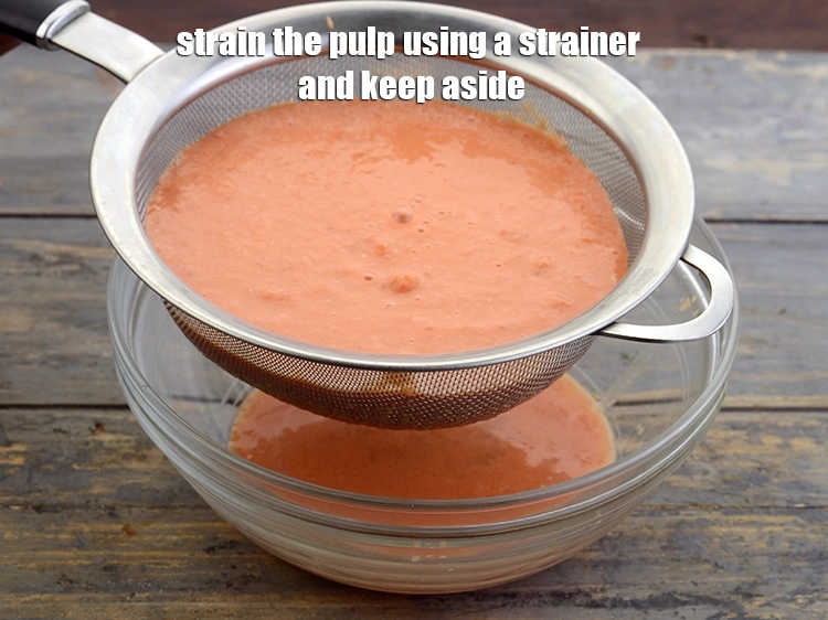 Step 5 – <p>પલ્પને ગળણીનો ઉપયોગ કરીને <strong>ગાળી લો</strong> અને એક બાજુ રાખો.</p>