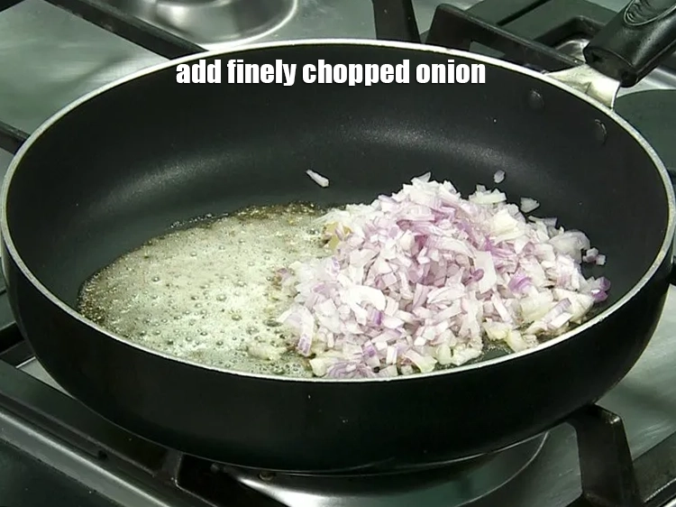 Step 8 – <p><span style="background-color:rgb(255,255,255);color:rgb(0,0,0);">1/2 કપ </span><a href="https://www.tarladalal.com/glossary-onions-pyaz-pyaaz-kanda-gujarati-548i#ing_3499"><u>બારીક સમારેલી ડુંગળી (finely chopped onions)</u></a> ઉમેરો. મધ્યમ તાપ પર 2 …