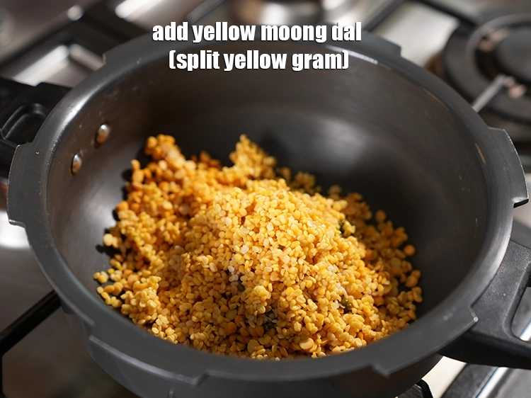 Step 12 – <p>૫ ચમચી <a href="https://www.tarladalal.com/glossary-yellow-moong-dal-split-yellow-gram-peeli-moong-dal-gujarati-488i">પીળી મગની દાળ (પીળા ચણાના દાળ)</a> ઉમેરો, ધોઈને પાણી કાઢી લો.</p>