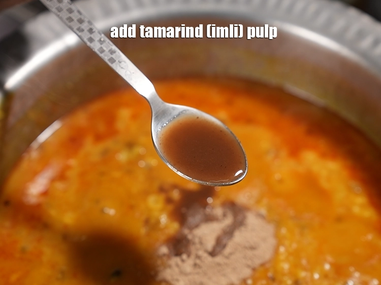 Step 30 – <p><span style="background-color:rgb(255,255,255);color:rgb(0,0,0);">1 ટેબલસ્પૂન </span><a href="https://www.tarladalal.com/glossary-tamarind-pulp-tamarind-extract-imli-ka-pulp-gujarati-838i"><u>આમલીનો પલ્પ (tamarind pulp)</u></a><u> ઉમેરો.</u></p>