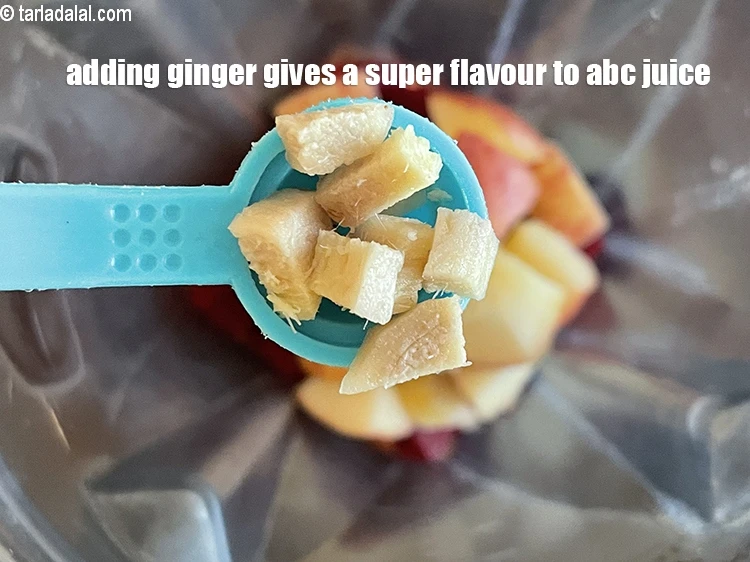 Step 10 – <p><a href="https://www.tarladalal.com/glossary-ginger-adrak-gujarati-453i#ing_2366"><u>સમારેલું આદુ (chopped ginger)</u></a> ઉમેરો. આદુ ઉમેરવાથી એબીસી જ્યુસને એક સુપર સ્વાદ મળે છે.</p>