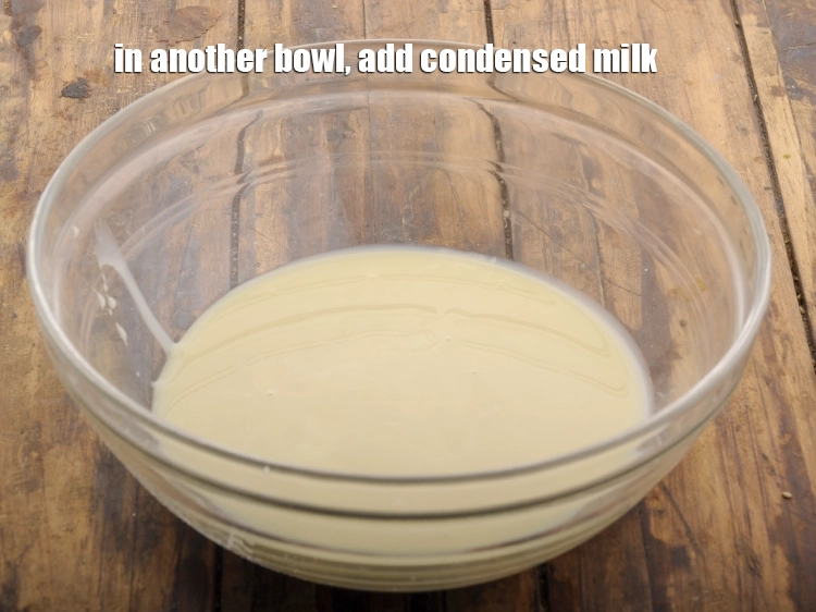 Step 13 – <p>બીજા બાઉલમાં ભીના ઘટકોને એકસાથે ભેળવવા માટે, <span style="background-color:rgb(255,255,255);color:rgb(0,0,0);">3/4 કપ </span><a href="https://www.tarladalal.com/glossary-condensed-milk-gujarati-672i"><u>કન્ડેન્સ્ડ મીલ્ક (condensed milk)</u></a> …