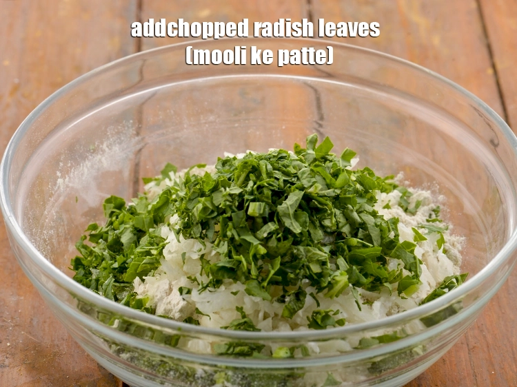 Step 8 – <p>ઉપરાંત, સમારેલા મૂળાના પાન ઉમેરો. તમે મૂળાના પાનને બદલે 1 કપ સમારેલા મેથી (મેથી) ના …