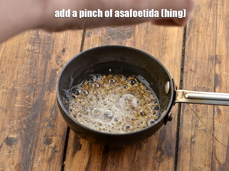 Step 11 – <p>જ્યારે બીજ તતડે, ત્યારે તવાને ગેસ પરથી ઉતારી લો અને એક ચપટી <span style="background-color:rgb(255,255,255);color:rgb(0,0,0);">એક ચપટી …