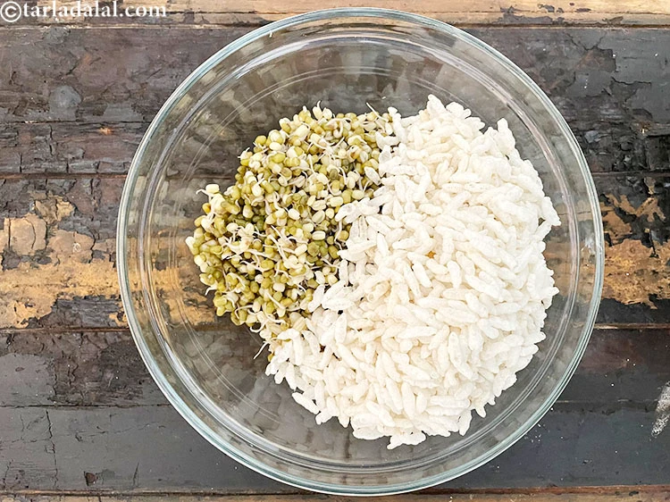 Step 12 – <p><span style="background-color:rgb(255,255,255);color:rgb(0,0,0);">2 કપ </span><a href="https://www.tarladalal.com/glossary-puffed-rice-kurmura-murmura-mamra-gujarati-537i"><u>મમરા ( puffed rice , kurmura )</u></a> ઉમેરો. જો તમારી પાસે …