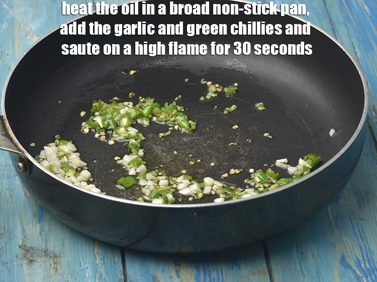 Step 5 – <p><span style="background-color:rgb(255,255,255);color:rgb(0,0,0);">એક ખુલ્લા નૉન-સ્ટીક પૅનમાં તેલ ગરમ કરી, તેમાં લસણ અને લીલા મરચાં મેળવી ઉંચા …