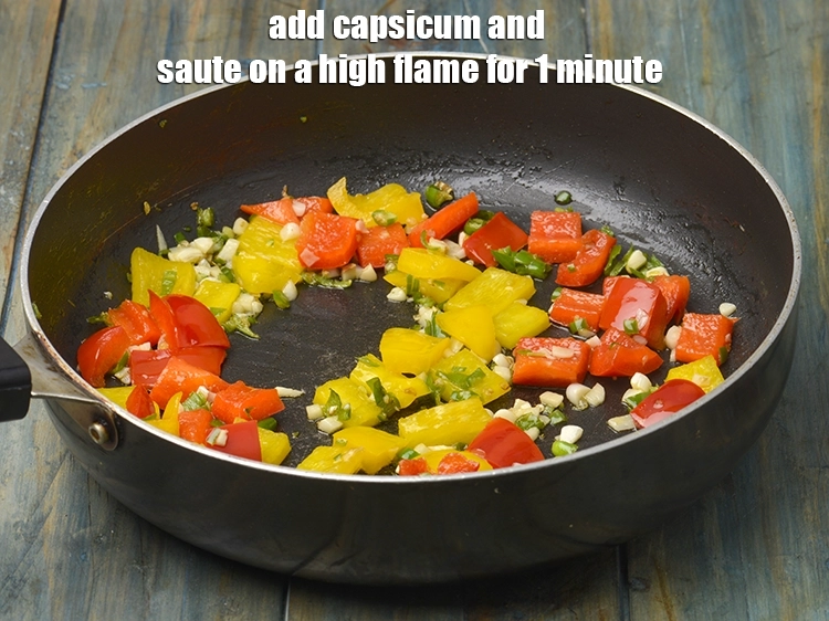 Step 6 – <p><span style="background-color:rgb(255,255,255);color:rgb(0,0,0);">પછી તેમાં સિમલા મરચાં મેળવી ઉંચા તાપ પર ૧ મિનિટ સુધી સાંતળી લો.</span></p>