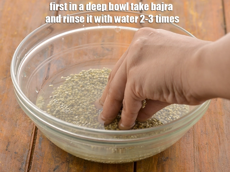 Step 1 – <p><strong>બાજરીની ખીચડી બનાવવા માટે</strong>, એક ઊંડા બાઉલમાં ૧/૨ કપ <a href="https://www.tarladalal.com/glossary-whole-bajra-black-millet-pearl-millet-gujarati-175i"><u>બાજરી (whole bajra )</u></a> લો …