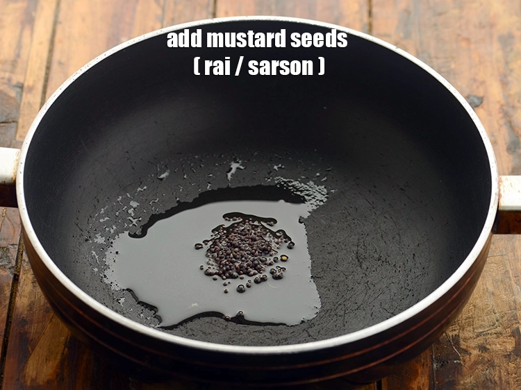 Step 5 – <p><span style="background-color:rgb(255,255,255);color:rgb(0,0,0);">1/2 ટીસ્પૂન </span><a href="https://www.tarladalal.com/glossary-mustard-seeds-sarson-rai-sarson-ke-beej-gujarati-525i"><u>રાઇ (mustard seeds ( rai / sarson)</u></a>ના દાણા ઉમેરો અને તેને …