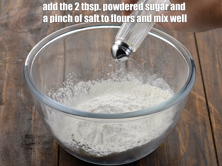 Step 3 – <p>૨ ટેબલસ્પૂન <a href="https://www.tarladalal.com/glossary-powdered-sugar-gujarati-280i"><u>પીસેલી સાકર (powdered sugar)</u></a> અને <span style="background-color:rgb(255,255,255);color:rgb(0,0,0);">એક ચપટીભર </span><a href="https://www.tarladalal.com/glossary-salt-namak-table-salt-gujarati-418i"><u>મીઠું (salt)</u></a> ઉમેરો.</p>