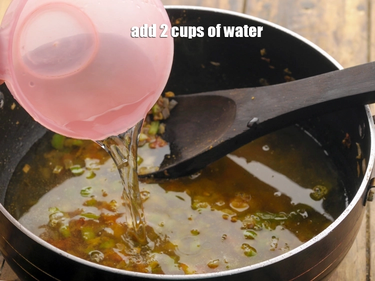 Step 17 – <p>૨ કપ <strong>પાણી</strong> ઉમેરો. જો તમને સૂપવાળી મેગી ગમે છે તો વધુ પાણી ઉમેરો. તમારા …