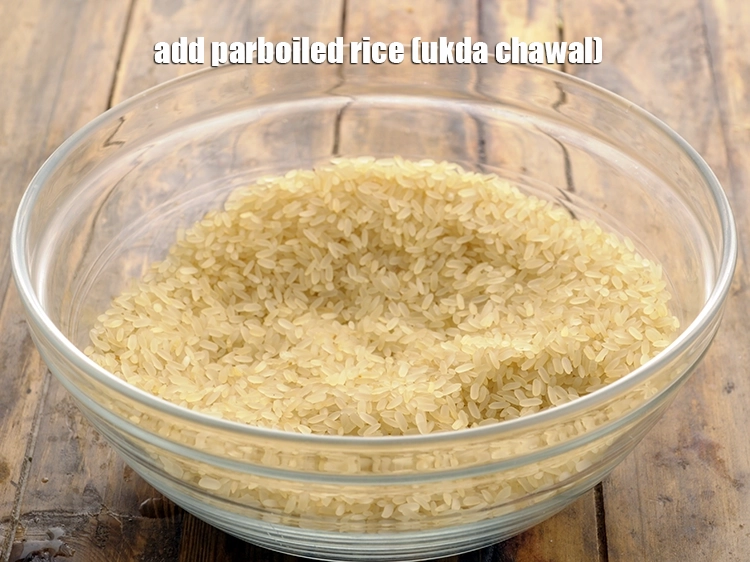 Step 30 – <p><span style="background-color:rgb(255,255,255);color:rgb(0,0,0);">1 કપ </span><a href="https://www.tarladalal.com/glossary-parboiled-rice-ukda-chawal-gujarati-538i"><u>ઉકળા ચોખા (parboiled rice (ukda chawal)</u></a> ઉમેરો. આ ભાત ખાસ કરીને …