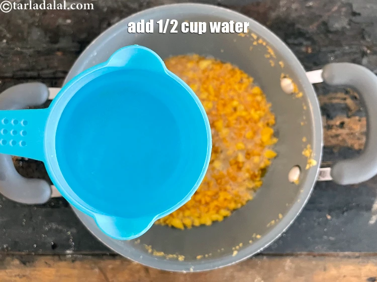 Step 18 – <p>1/2 કપ પાણી ઉમેરો.</p>