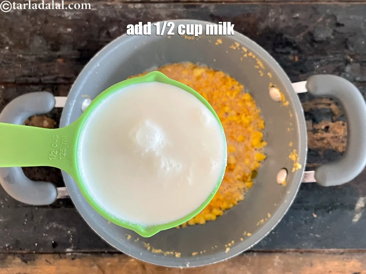 Step 19 – <p>1/2 કપ દૂધ ઉમેરો.</p>