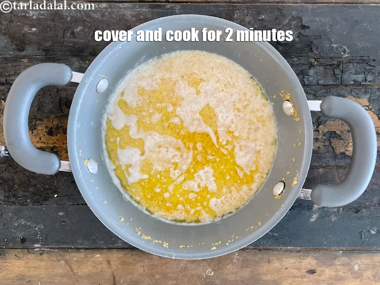 Step 21 – <p>ઢાંકીને ધીમા તાપે 1 થી 2 મિનિટ સુધી રાંધો, ક્યારેક ક્યારેક હલાવતા રહો.</p>