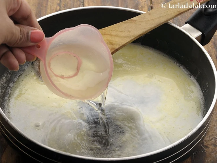 Step 5 – <p>1/2 કપ પાણી ઉમેરો.</p>