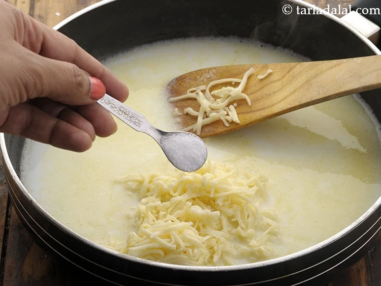 Step 7 – <p>મીઠું ઉમેરો. ચીઝમાં મીઠું હોય છે, તેથી આ તબક્કે ઉમેરતી વખતે ધ્યાન રાખો.</p>