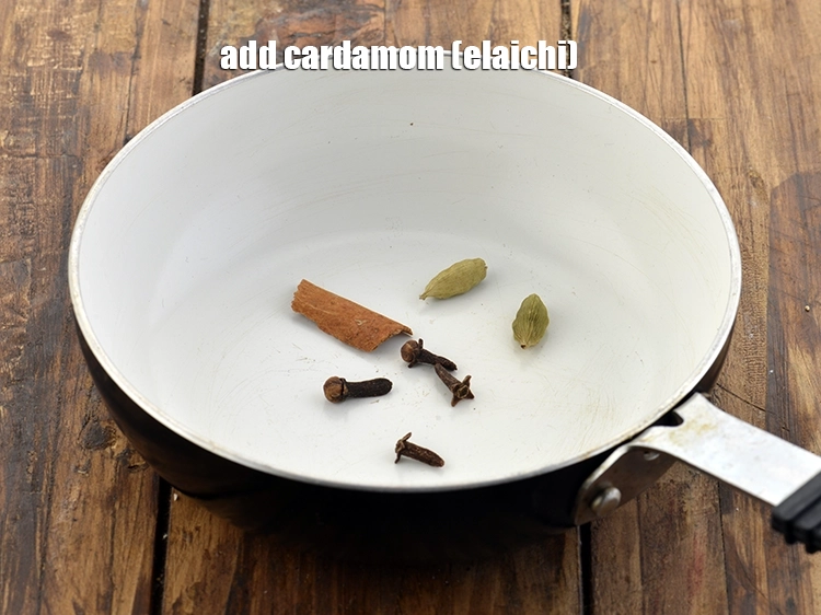 Step 11 – <p>હવે <span style="background-color:rgb(255,255,255);color:rgb(0,0,0);">2 </span><a href="https://www.tarladalal.com/glossary-cardamom-elaichi-gujarati-262i"><u>એલચી (cardamom, elaichi)</u></a> ઉમેરો.</p>