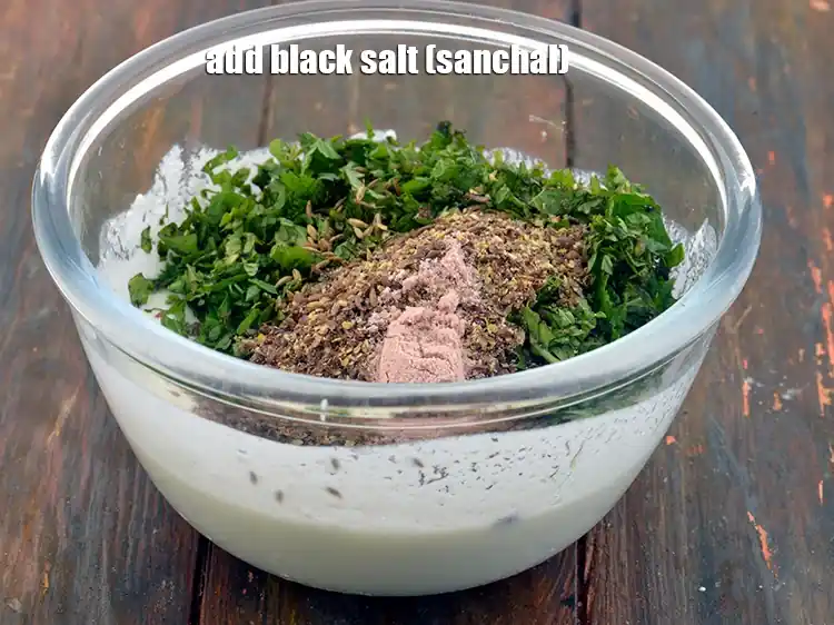 Step 10 – <p><span style="background-color:rgb(255,255,255);color:rgb(0,0,0);">1/4 ટીસ્પૂન </span><a href="https://www.tarladalal.com/glossary-black-salt-sanchal-kala-namak-gujarati-422i"><u>સંચળ (black salt, sanchal)</u></a> ઉમેરો. તે દહીંમાં ખાસ સ્વાદ ઉમેરે છે.</p>