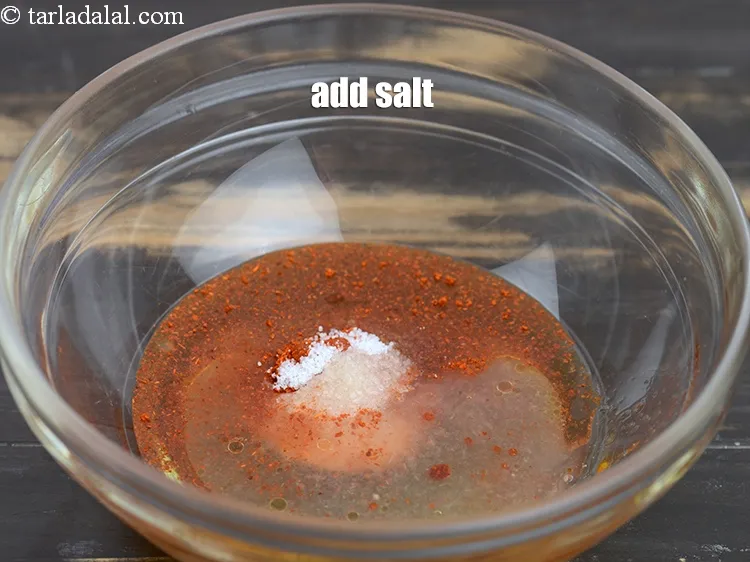 स्टेप 12 – <p><span style="background-color:rgb(255,255,255);color:rgb(0,0,0);">१/८ टी-स्पून </span><a href="https://www.tarladalal.in/glossary-salt-namak-table-salt-hindi-418i"><u>नमक (salt)</u></a><u> </u>डालें।</p>