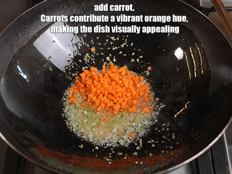 स्टेप 32 – <p>१/४ कप बारीक <a href="https://www.tarladalal.in/glossary-carrot-gajar-gajjar-hindi-253i#ing_2376"><u>कटा हुआ गाजर (chopped carrot)</u></a> डालें। …