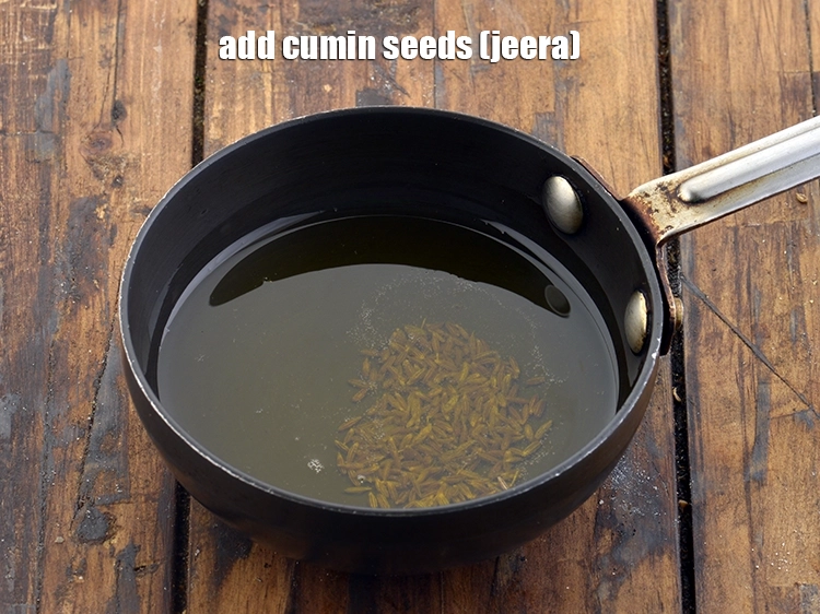 स्टेप 38 – <p>तेल गरम होने पर <span style="background-color:rgb(255,255,255);color:rgb(0,0,0);">1/4 टी-स्पून </span><a href="https://www.tarladalal.com/glossary-cumin-seeds-jeera-zeera-hindi-381i"><u>जीरा ( …