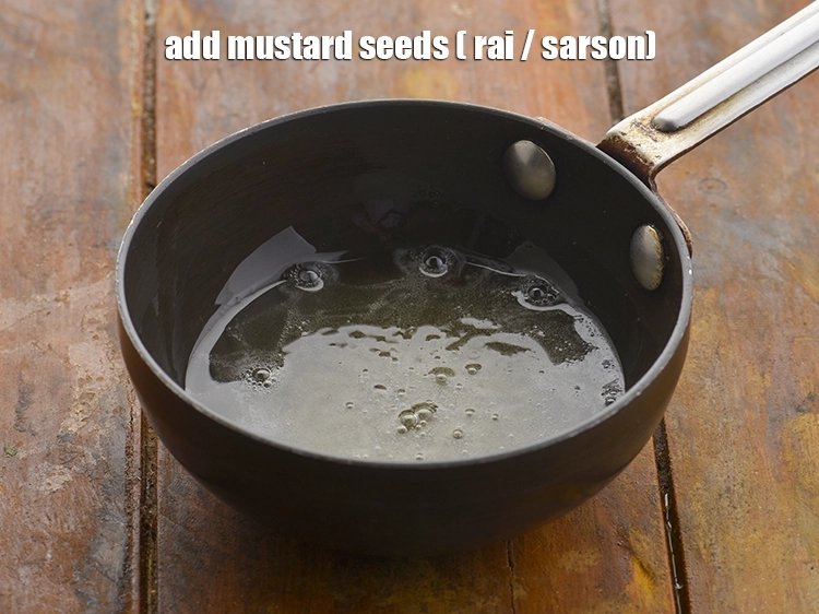 स्टेप 20 – <p><span style="background-color:rgb(255,255,255);color:rgb(0,0,0);">1/2 टी-स्पून </span><a href="https://www.tarladalal.com/glossary-mustard-seeds-sarson-rai-sarson-ke-beej-hindi-525i"><u>सरसों (mustard seeds ( rai / …