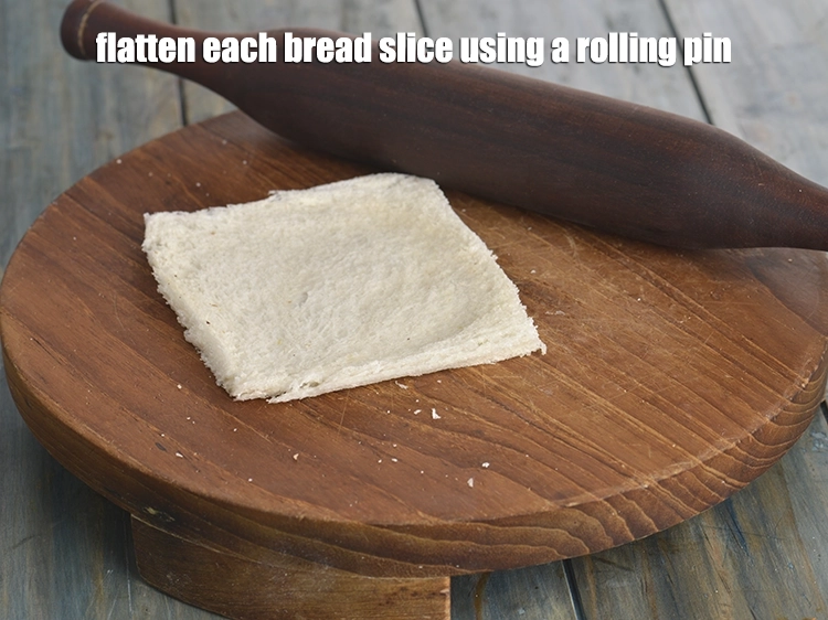 स्टेप 2 – <p>एक रोलिंग पिन का उपयोग करके प्रत्येक <a href="https://www.tarladalal.com/glossary-bread-hindi-219i"><u>ब्रेड (bread)</u></a> …