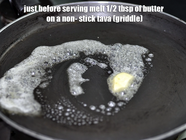 स्टेप 25 – <p>परोसने से पहले नॉन-स्टिक तवे पर १/२ टेबलस्पून <strong>मक्खन</strong> को …