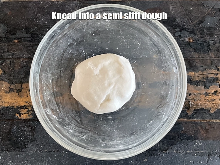 स्टेप 14 – <p>थोड़ा सख्त आटा गूंथ लें।</p>