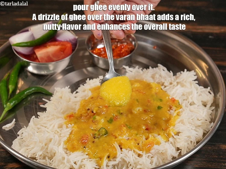 स्टेप 33 – <p>इसके ऊपर एक छोटा चम्मच <a href="https://www.tarladalal.com/glossary-ghee-hindi-245i"><u>घी (ghee)</u></a> समान रूप …