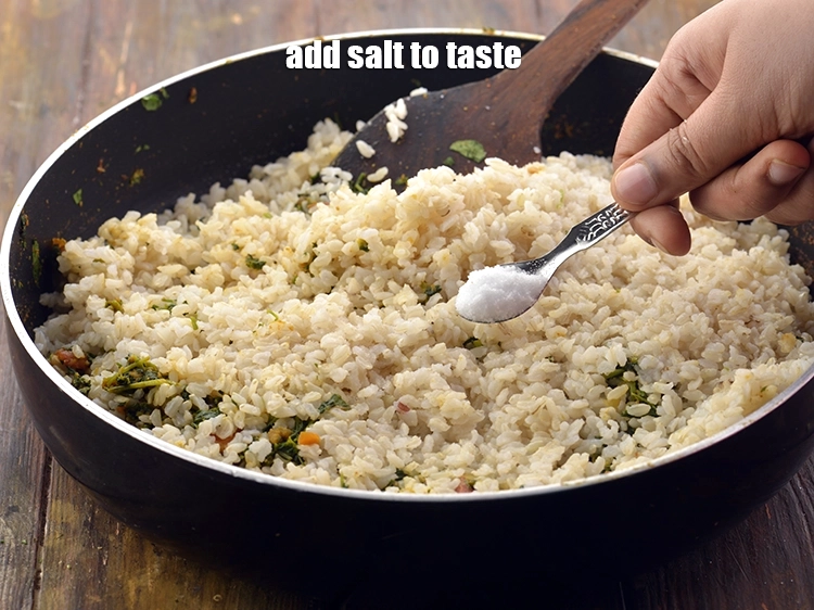 स्टेप 30 – <p><strong>टमाटर मेथी चावल</strong> में स्वादानुसार <a href="https://www.tarladalal.com/glossary-salt-namak-table-salt-hindi-418i"><u>नमक (salt)</u></a> भी डालें।</p>