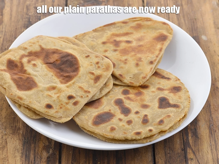 स्टेप 44 – <p><span style="background-color:rgb(255,255,255);color:rgb(0,0,0);">अब हमारे </span><strong>सारे सादे पराठे</strong><span style="background-color:rgb(255,255,255);color:rgb(0,0,0);"> बनकर तैयार हैं. …