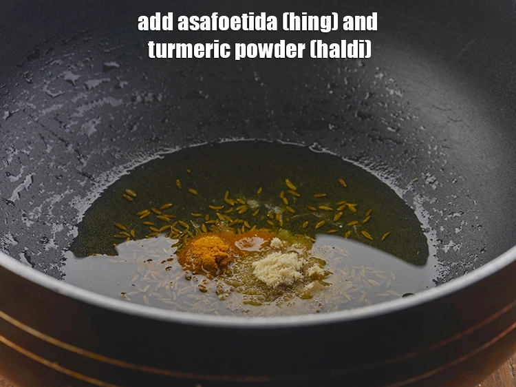 स्टेप 15 – <p><strong>जब जीरा चटक जाए तो</strong> <span style="background-color:rgb(255,255,255);color:rgb(0,0,0);">एक चुटकी </span><a href="https://www.tarladalal.com/glossary-asafoetida-hing-hindi-113i"><u>हींग …