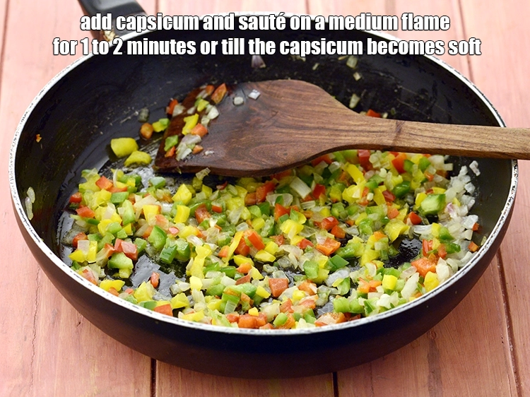 स्टेप 2 – <p>उसमें <span style="background-color:rgb(255,255,255);color:rgb(0,0,0);">1/2 कप </span><a href="https://www.tarladalal.com/glossary-capsicum-shimla-mirch-bell-pepper-hindi-163i#ing_2311"><u>कटी हुई शिमला मिर्च (chopped …