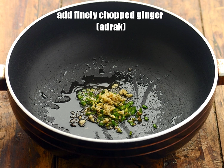 स्टेप 14 – <p><span style="background-color:rgb(255,255,255);color:rgb(0,0,0);">1/2 टी-स्पून </span><a href="https://www.tarladalal.com/glossary-ginger-adrak-hindi-453i#ing_2366"><u>कटा हुआ अदरक (chopped ginger)</u></a> भी …