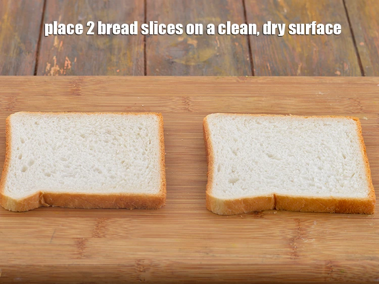 स्टेप 10 – <p>एक साफ, सूखी सतह पर २ <a href="https://www.tarladalal.com/glossary-bread-hindi-219i"><u>ब्रेड (bread)</u></a> स्लाइस …