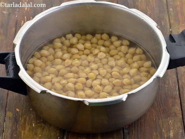 स्टेप 5 – <p>ढक्कन खोलने से पहले भाप को निकलने दें।</p>