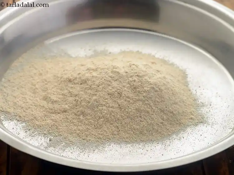 स्टेप 53 – <p><strong>राजस्थानी बाटी</strong> तैयार करने के लिए, एक गहरे कटोरे में …