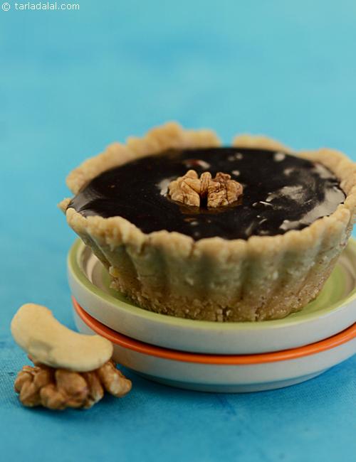 Akhrot Choco Tarts an exciting way to serve walnut barfi with chocolate.