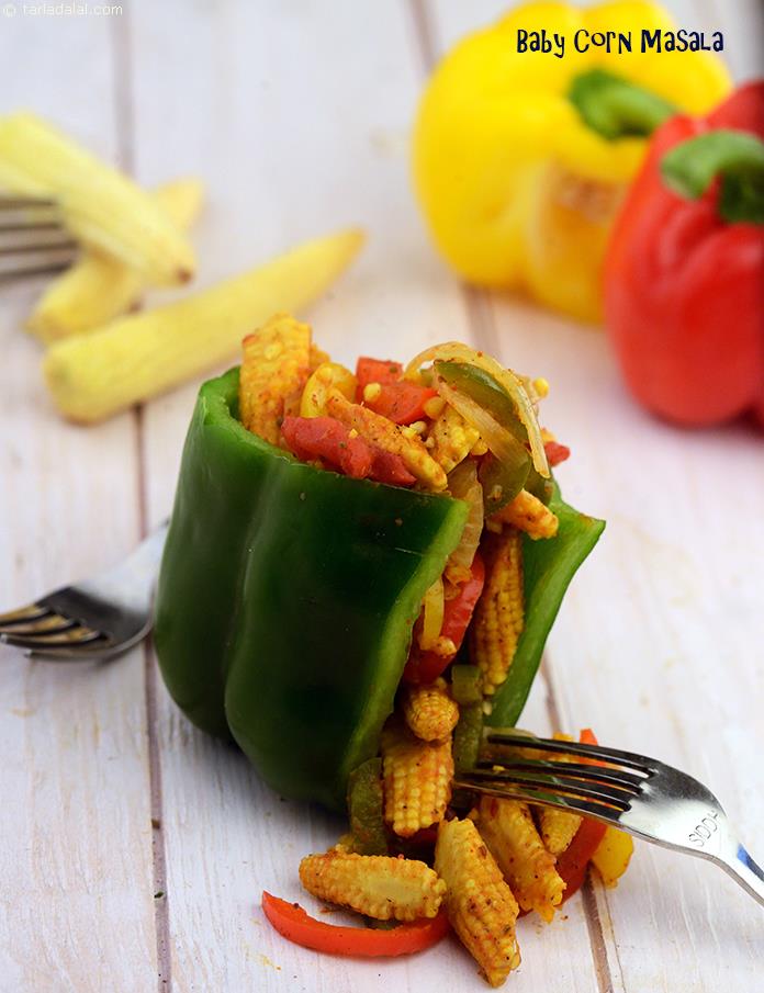 Baby corn, sliced onions and capsicum literally play together in this attractive, mouth-watering and crunchy dry subzi. Using coloured capsicums greatly enhances the visual appeal of this dish.