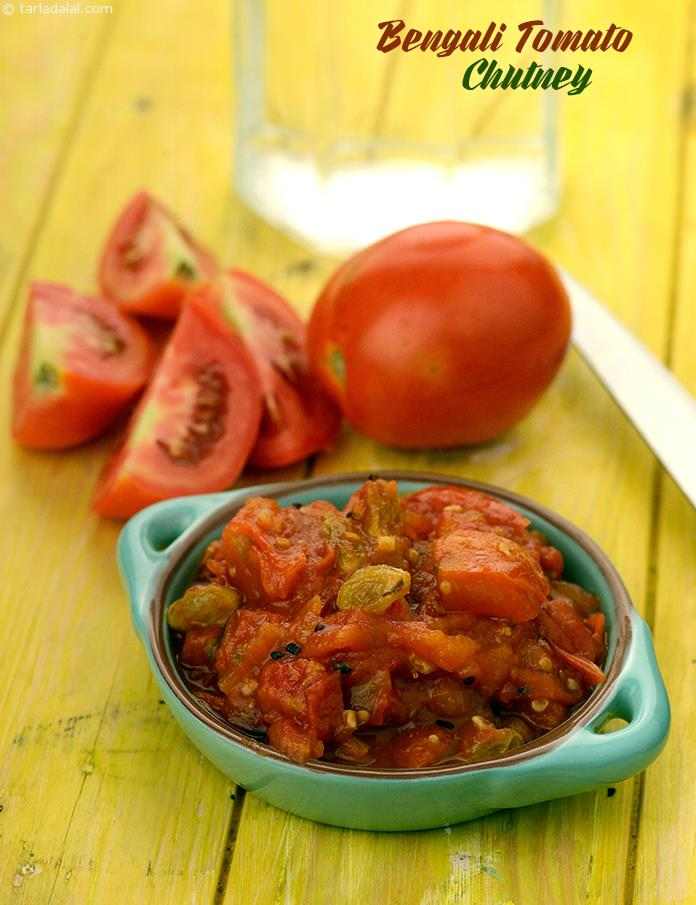 This tangy tomato chutney is richly flavoured with panch phoran,while ginger and green chillies add spice to the Bengali Tomato Chutney, raisins and a spoon of sugar balance the tartness of tomatoes, making the chutney very pleasant to the palate.