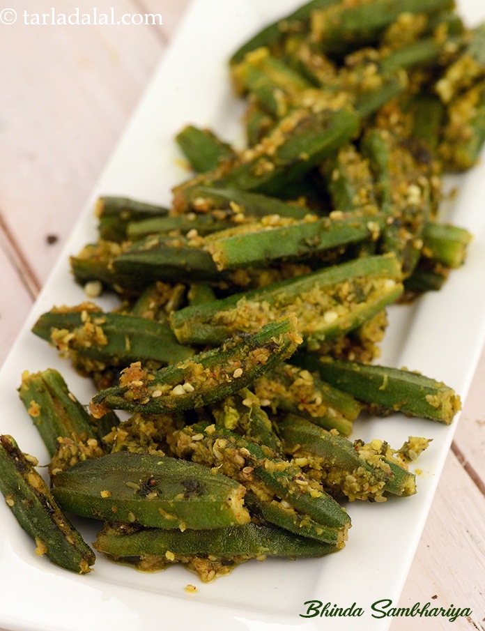 Bhinda sambhariya is an irresistible preparation of fresh okras, stuffed with an exciting sesame-tinged coconut and coriander mixture, and cooked in its own juice. Choose very small and tender okras for the best flavour.