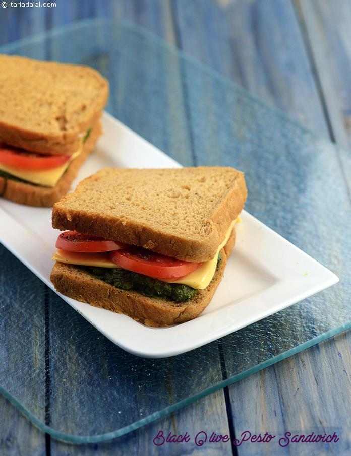 Black Olive Pesto sandwich,much favourite pesto made using walnuts is used as a spread to make this sandwich…walnut does wonders for the brain.