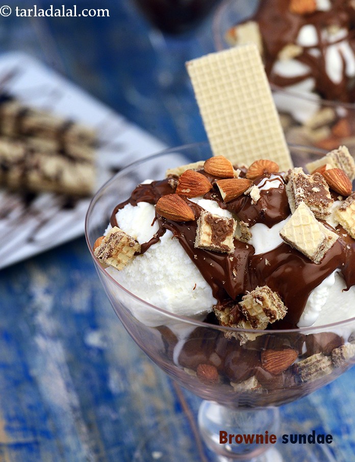 Nuts, Nutella, ice-cream, brownie, name what you like and you will find it in this Brownie Sundae! With readily available ingredients, this dessert can be prepared in less than 10 minutes.