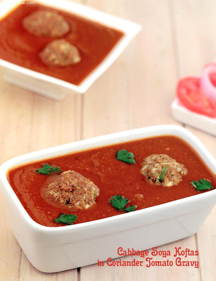 This delicious gravy is a treasure-trove of folic acid, while the unique koftas made of cabbage, soya granules and paneer pool in loads of fibre, protein and calcium. Serve the Cabbage Soya Koftas in Coriander Tomato Gravy immediately. 